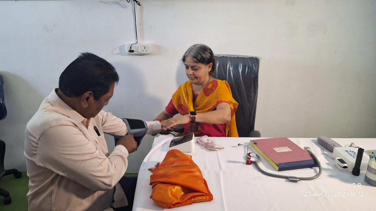 A driver's blood pressure and vitals being checked at the clinic